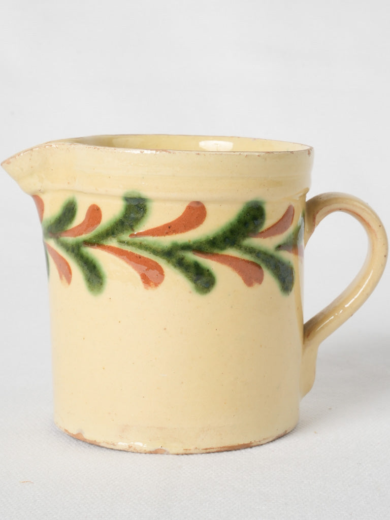 Charming ochre motifs cream pitcher