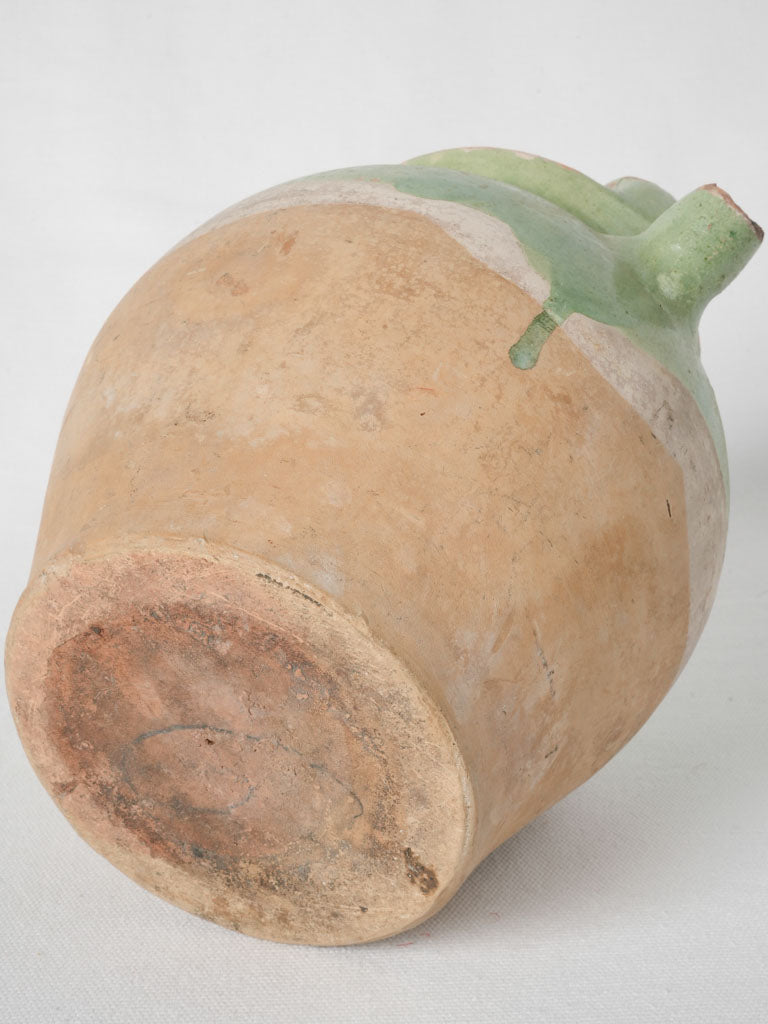 Aged terracotta Provençal water pitcher