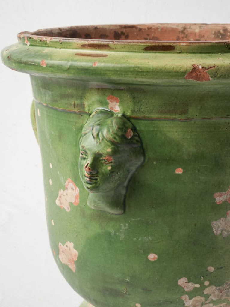 Sculptural face medallion terracotta urn