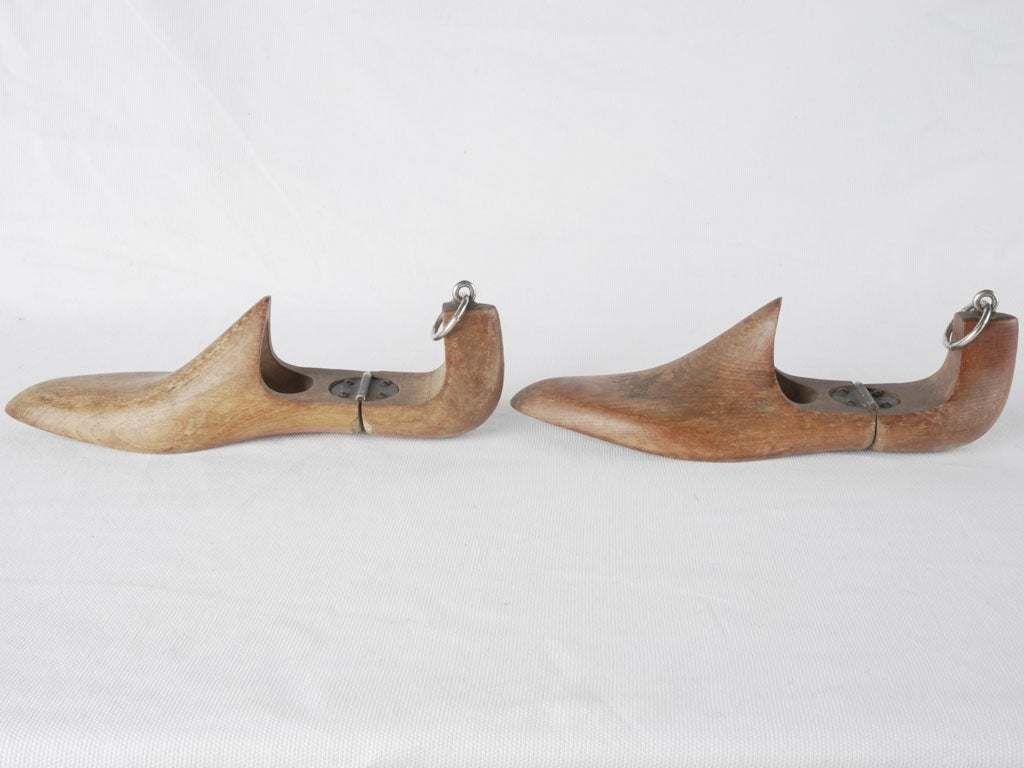 Charming hinged wooden shoe stay