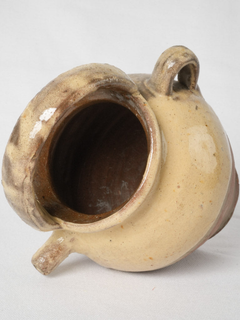 Decorative yellow-glazed ceramic water jug