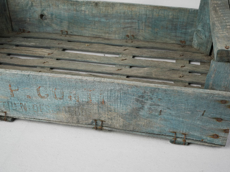 Sun-faded blue wooden herb bin  