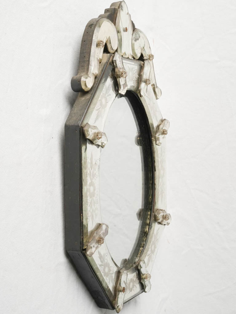 Handcrafted 1940s mirror, scrolled crest