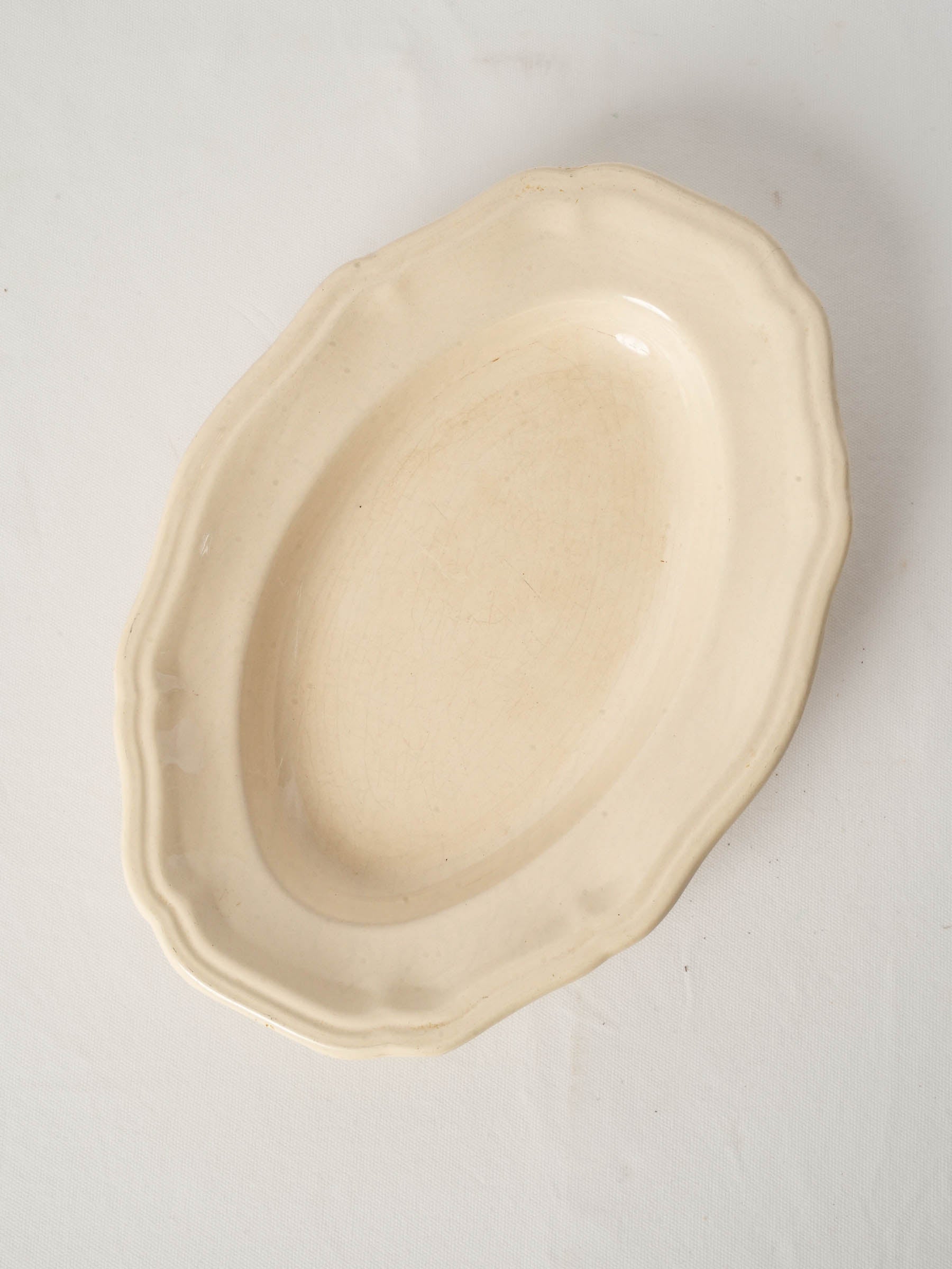 Antique french ivory-glazed ceramic serving dish