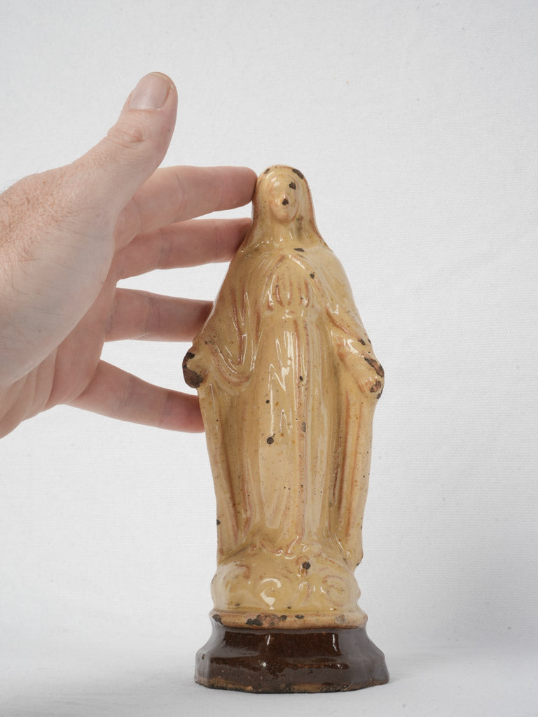 Honey-toned earthenware devotional figure