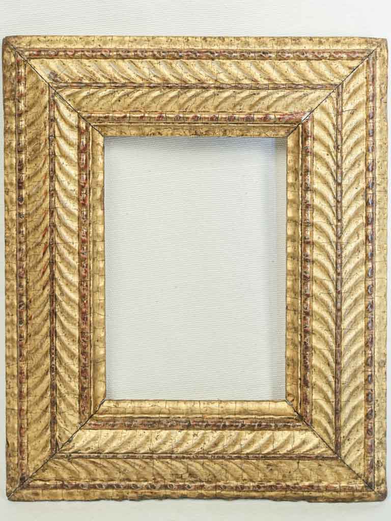 Elegant gilded stucco frame