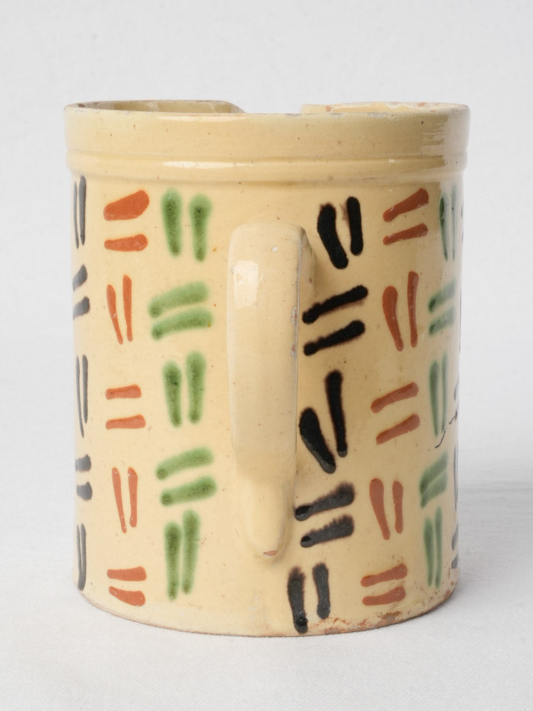 Durable strap-handled vessel