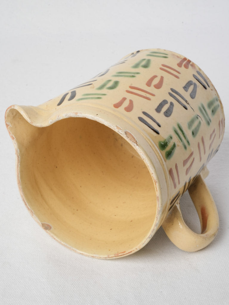 Cream-hued decorative pitcher