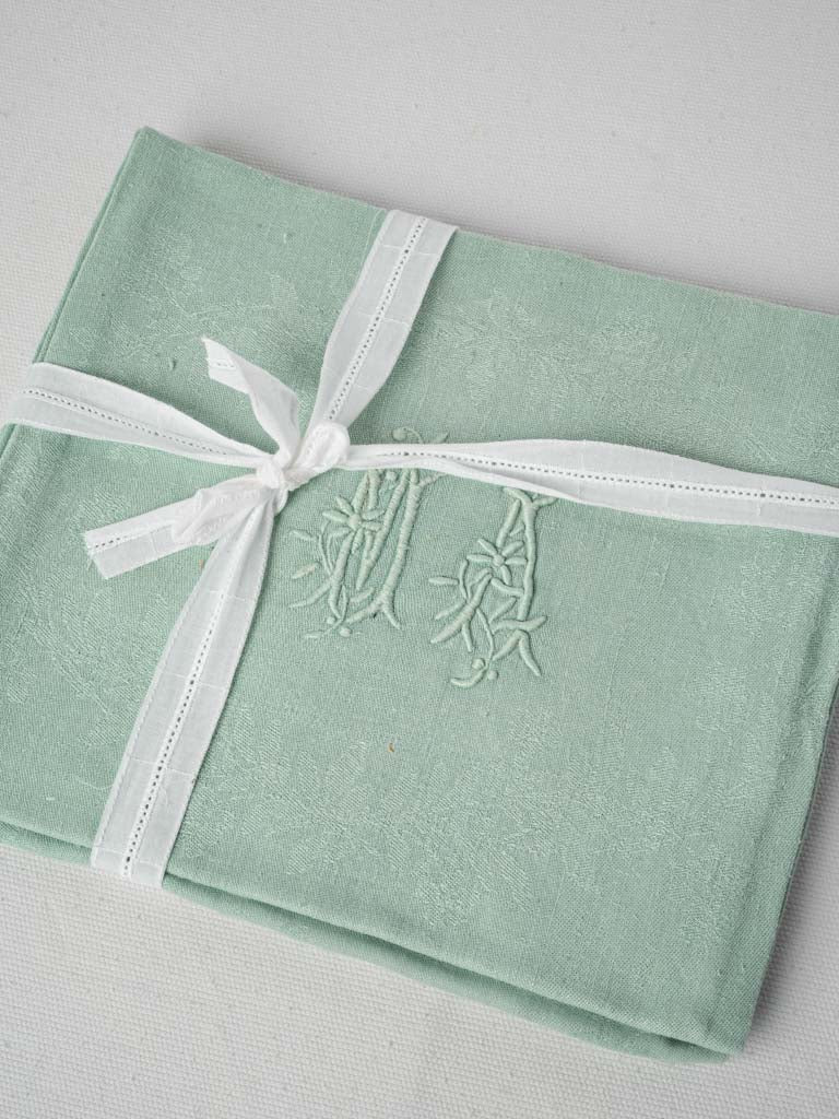 Monogrammed sage-green damask napkins