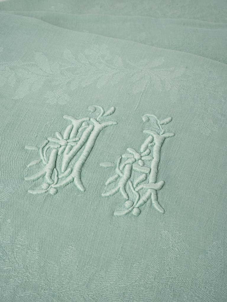 Refined soft-green damask napkins