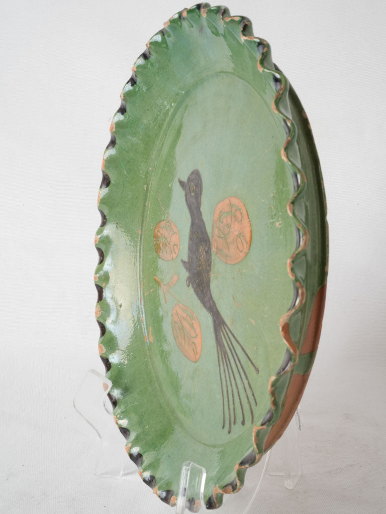 Delightful black bird design terracotta dish