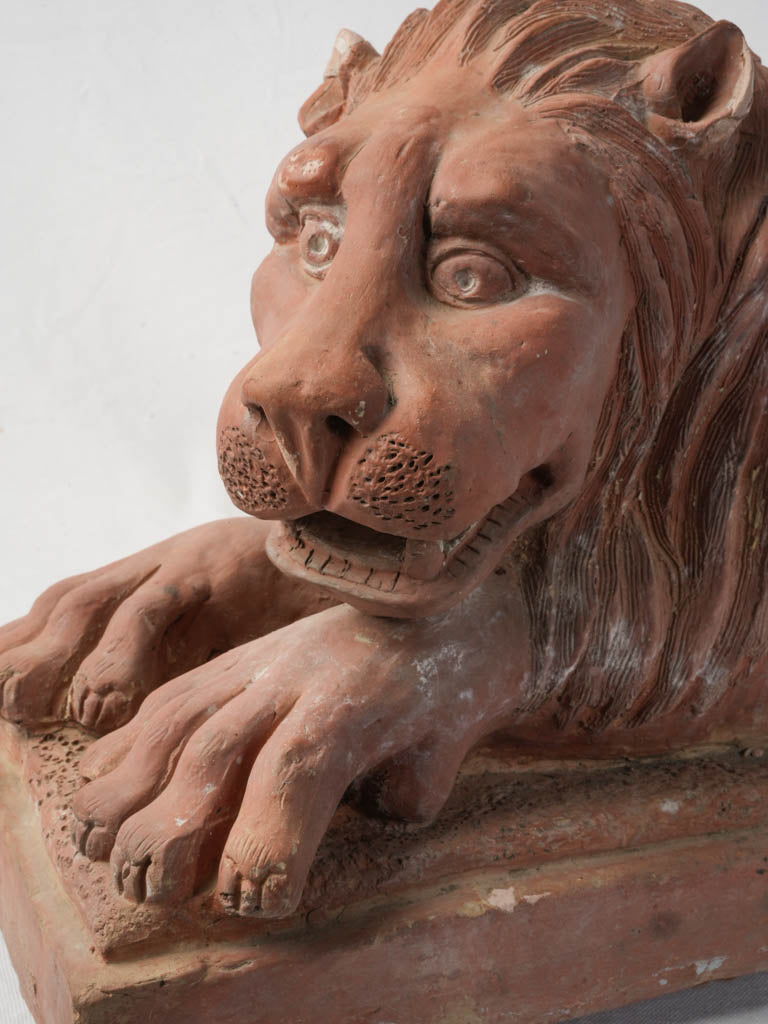 Historic elongated lion entryway sculpture