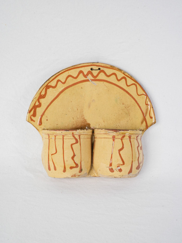 Antique rustic cutlery drainer.