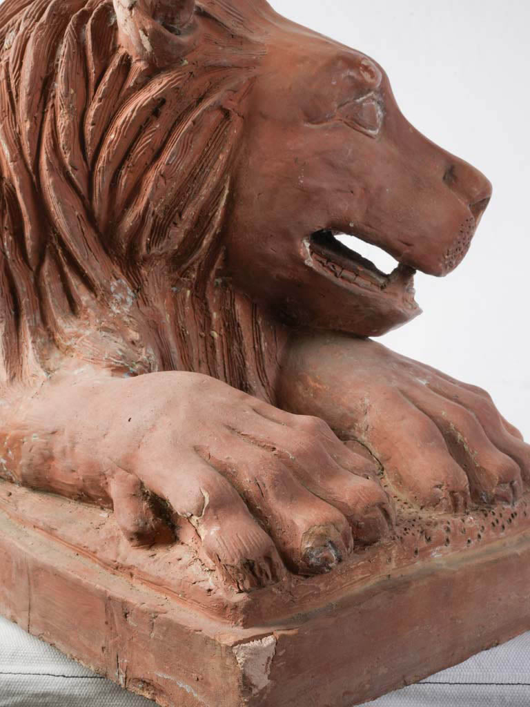 Earthy patina terracotta lion statue