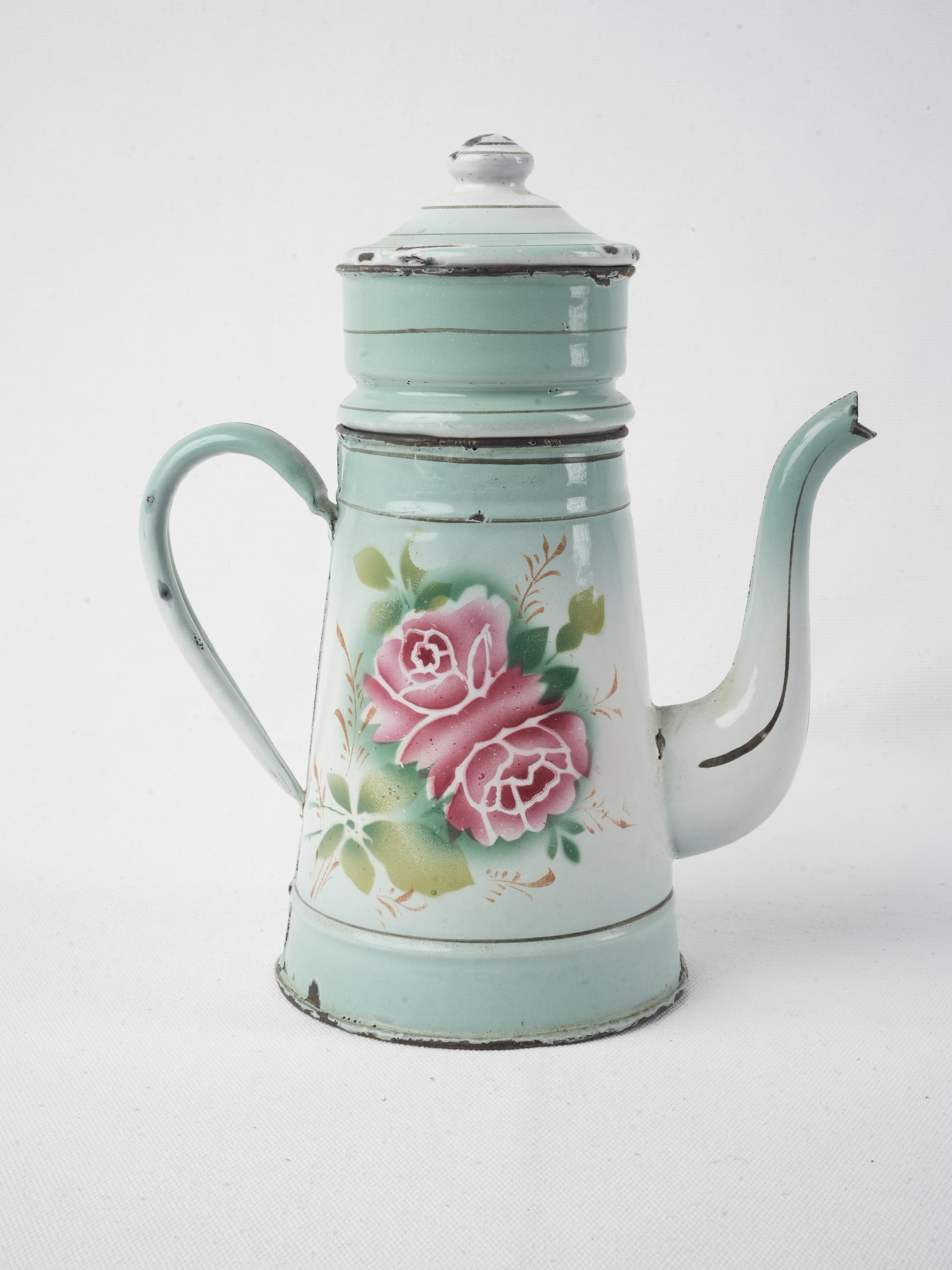 Rustic antique enamelware coffee kettle