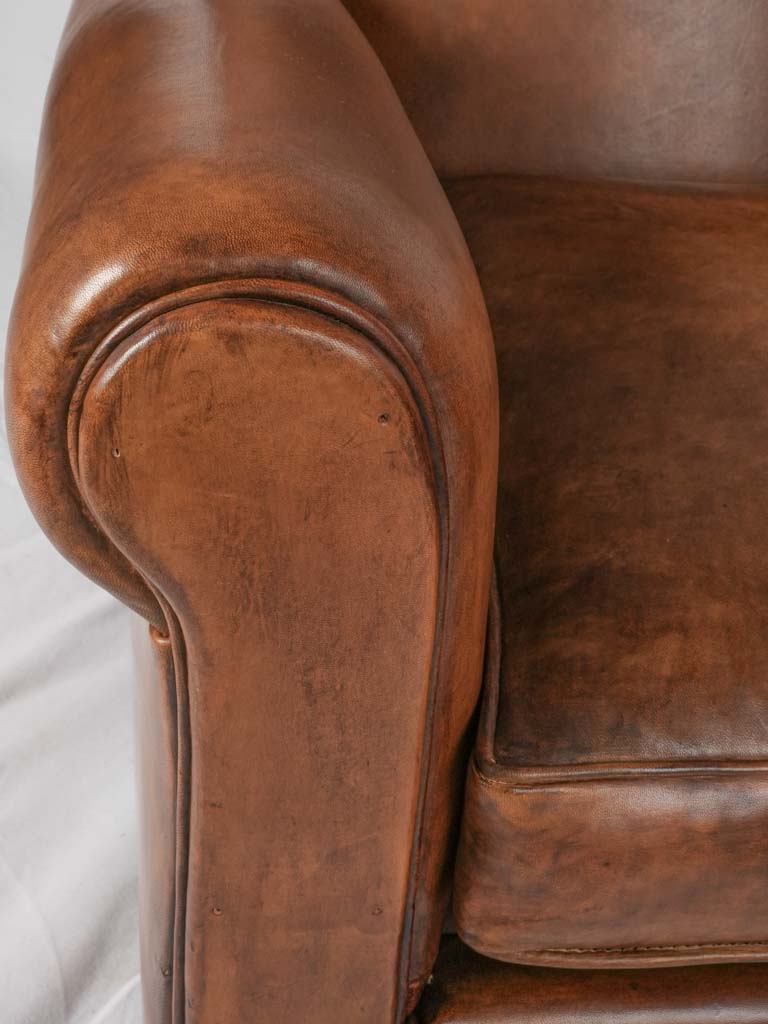 Unique patina finished club chairs