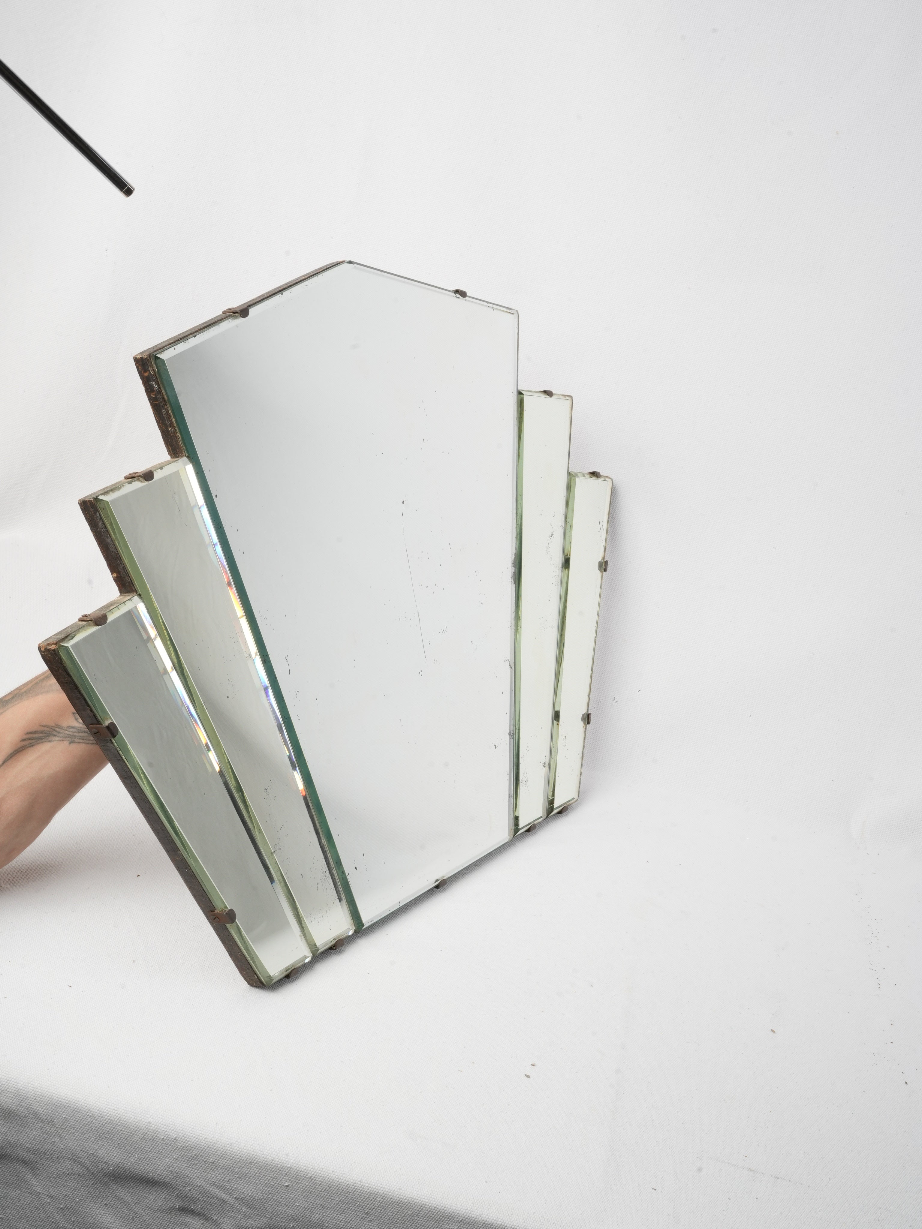 Elegant patina-accented decorative mirror