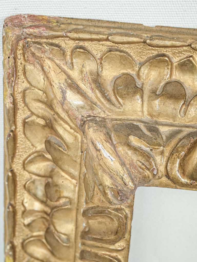 Richly carved foliate gilded frame
