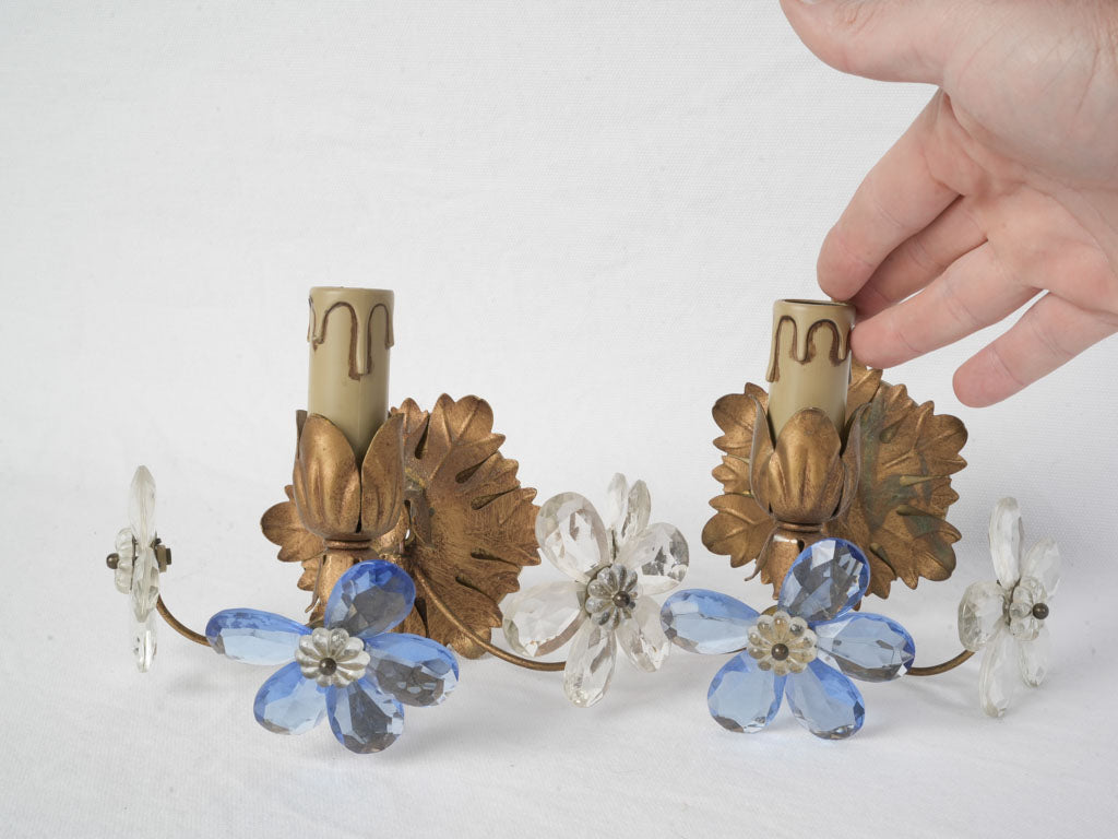 Age-softened patina wall sconces