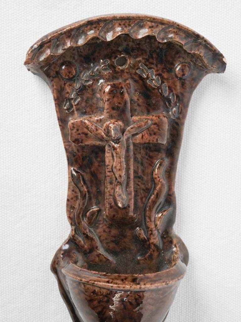 Historical umber-color ceramic vessel