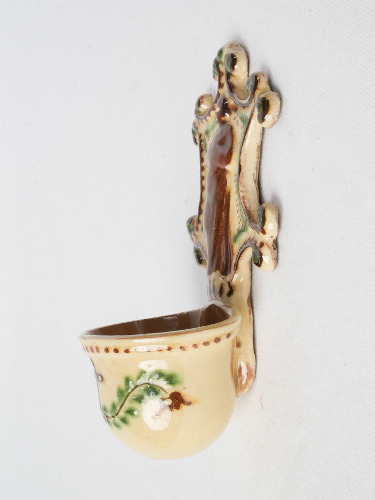 Cream colored holy water font