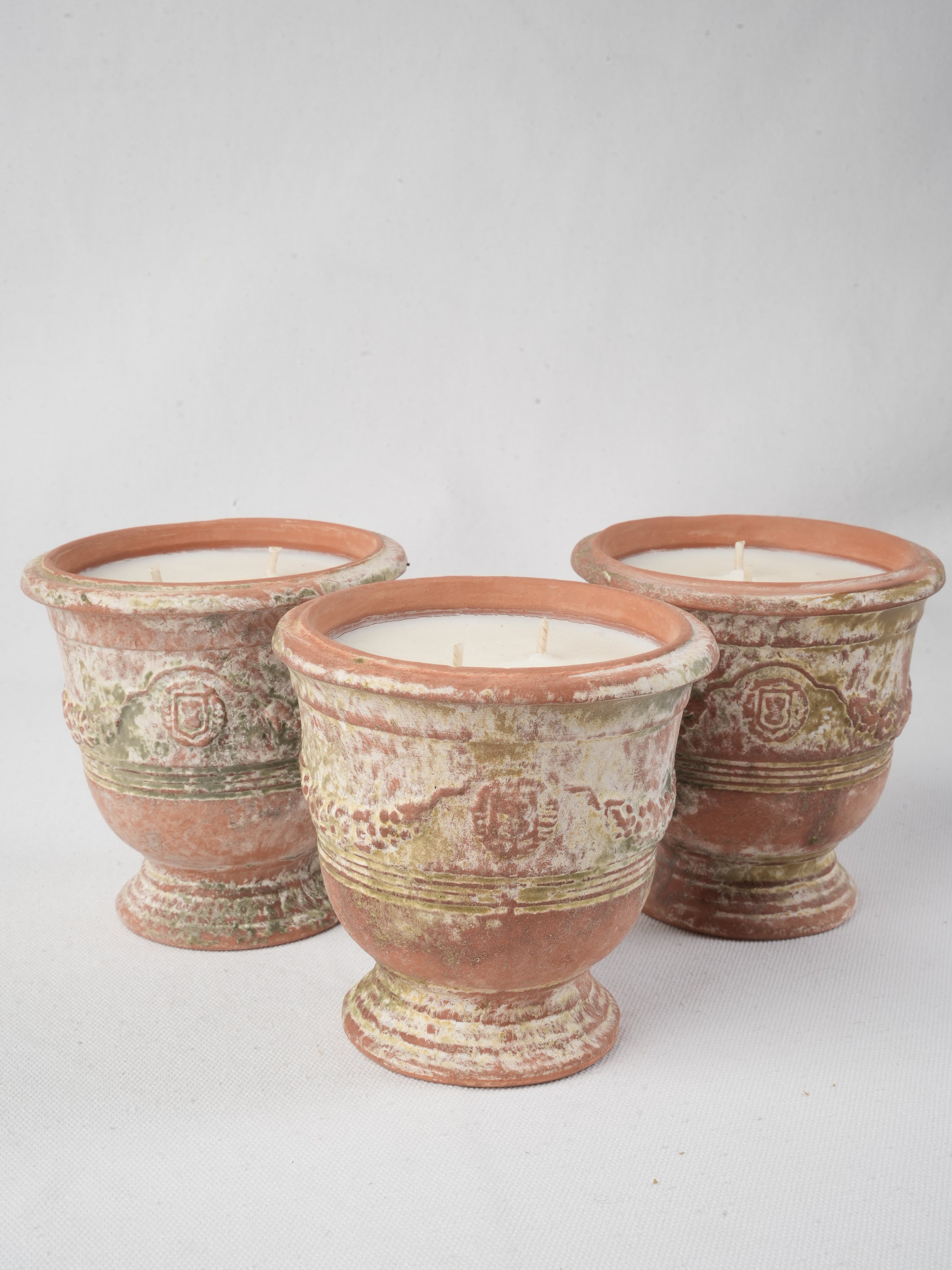 Ochre and green decorative vessels