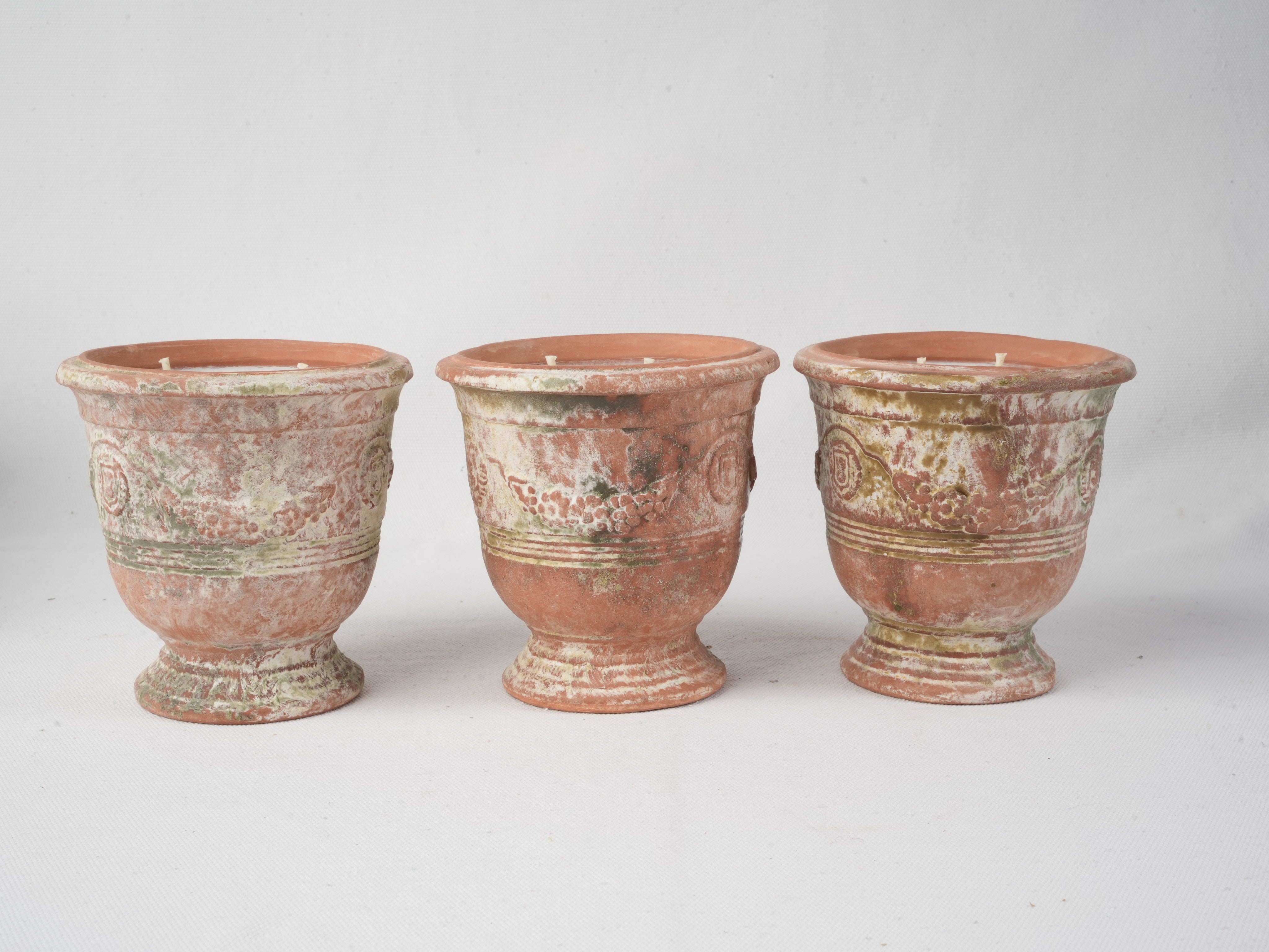 Patinated stoneware French-style containers