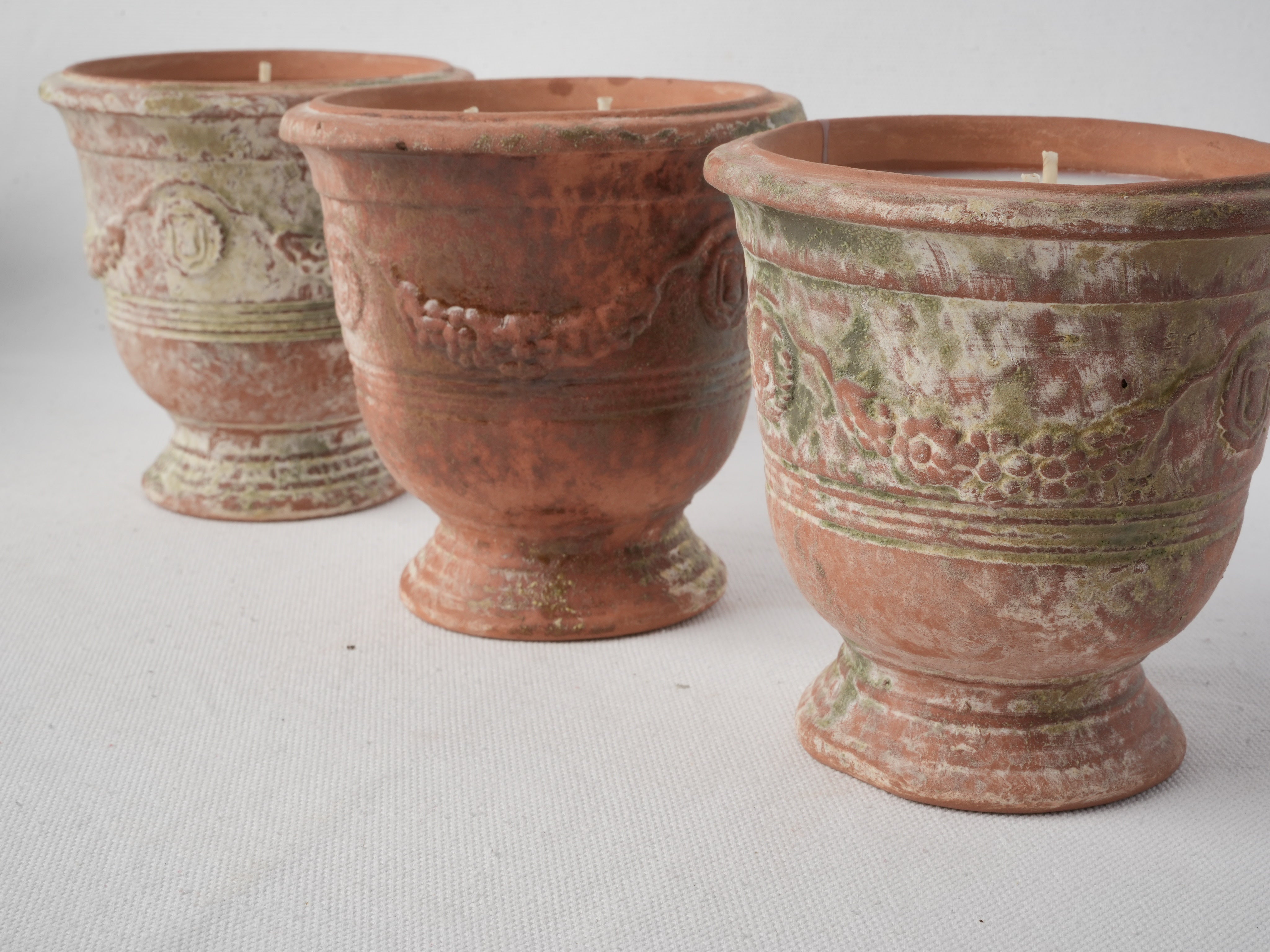 Double-wick mossy green pots