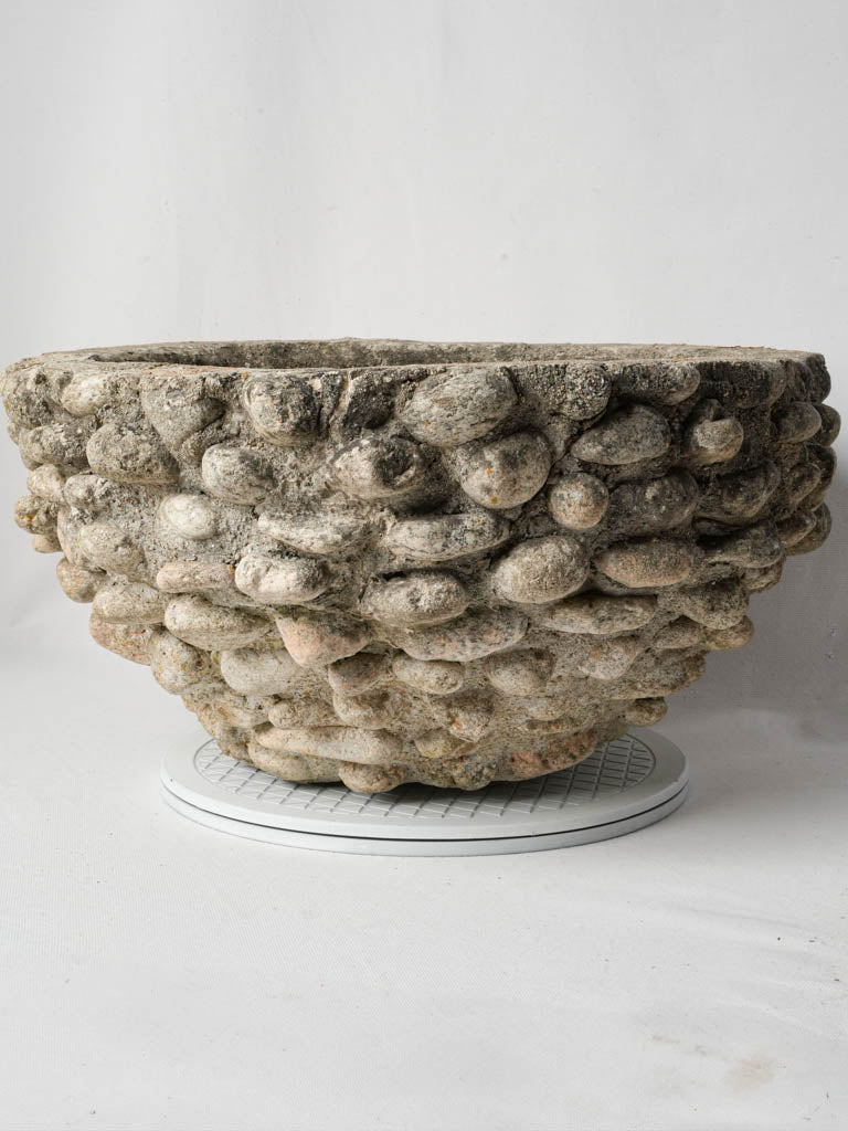 Moss-touched antiqued French planter