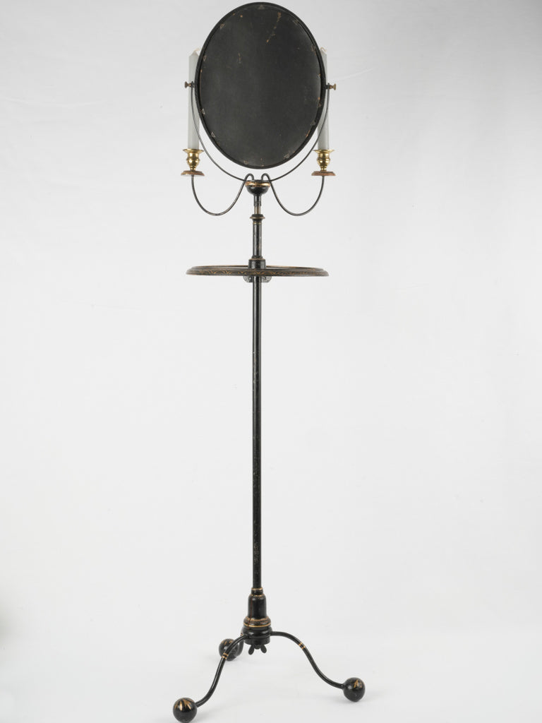 Antique Victorian-era standing mirror with candles