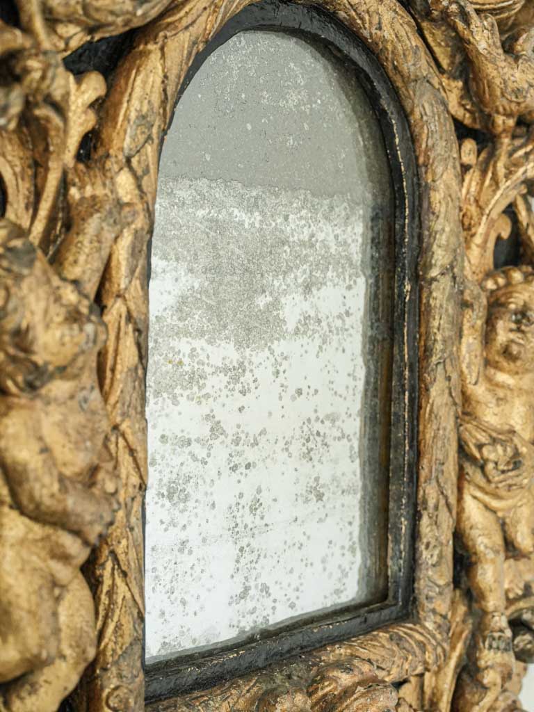 Ornate giltwood 17th-century mirror