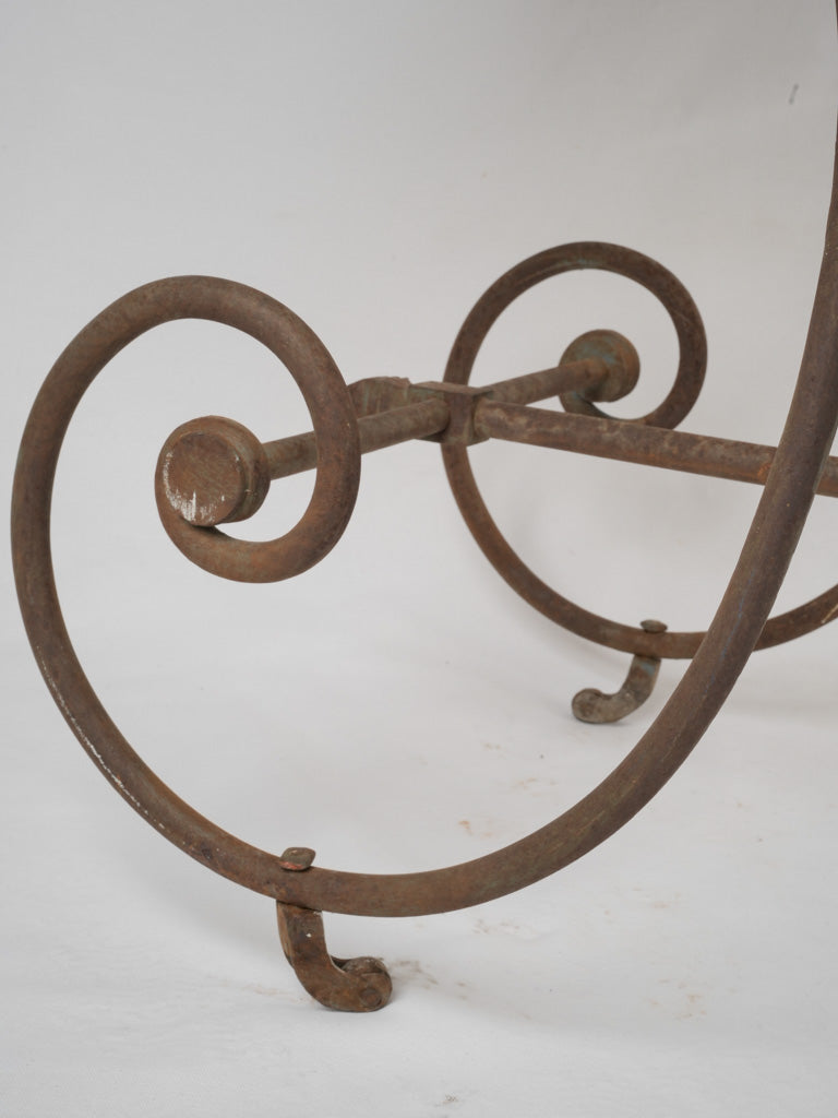 Delightful antique escargot spiral iron base