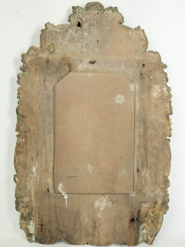 Symbolic detailed gilded wood mirror