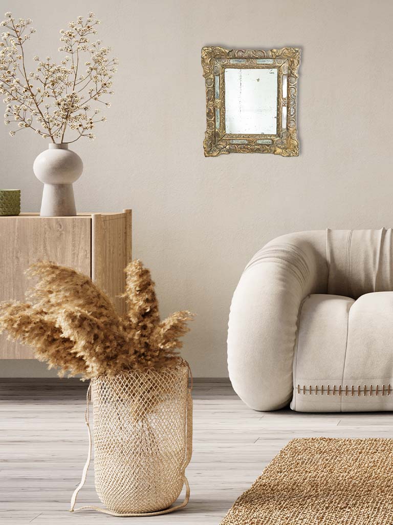 Richly sculpted antique mirror