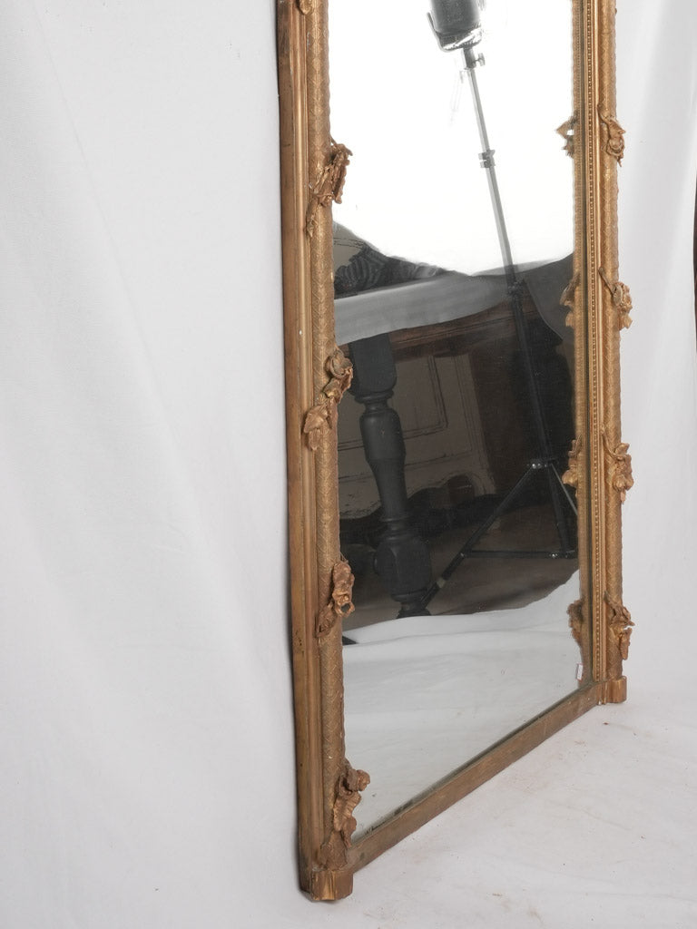 Ornate French gilded mantle mirror