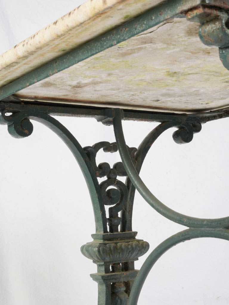 Traditional iron base accent table