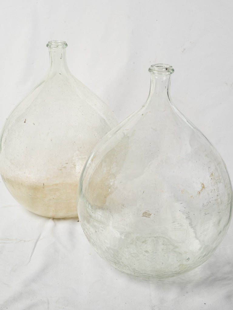 Antique French glassblown demijohns