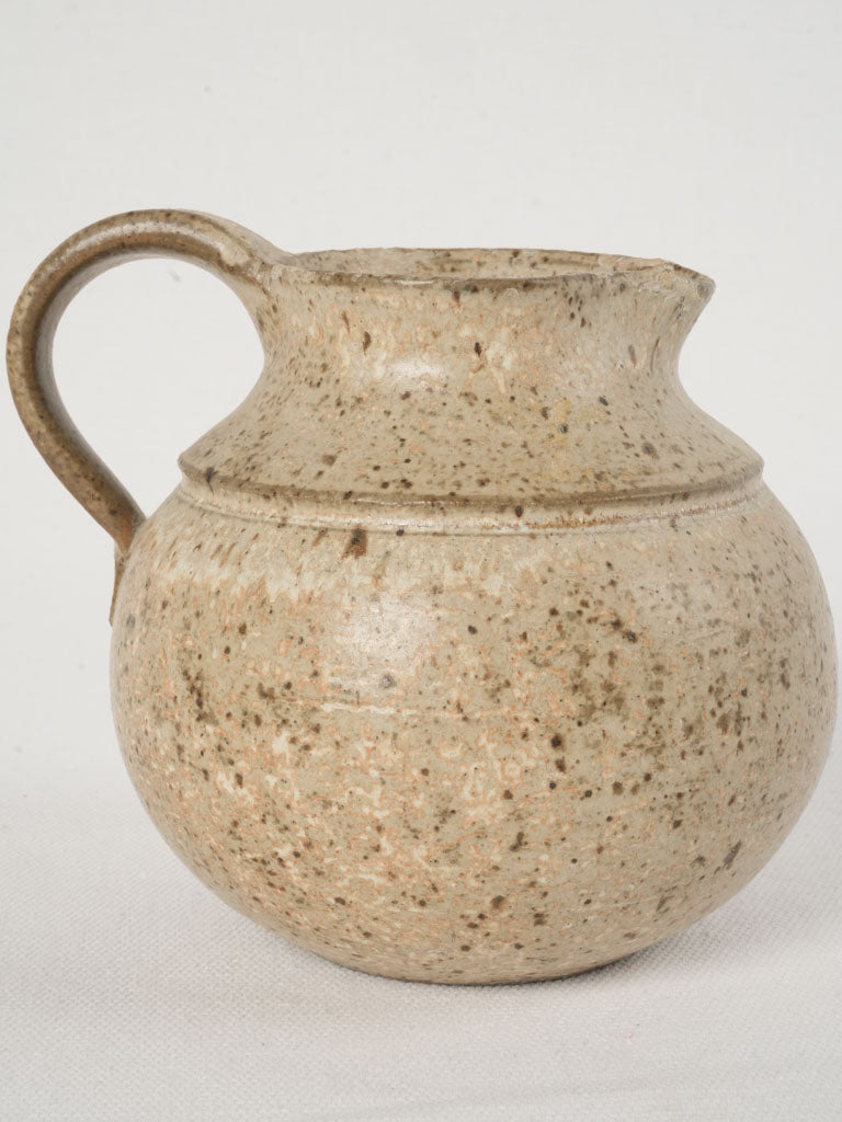 Petite speckled beige creamer