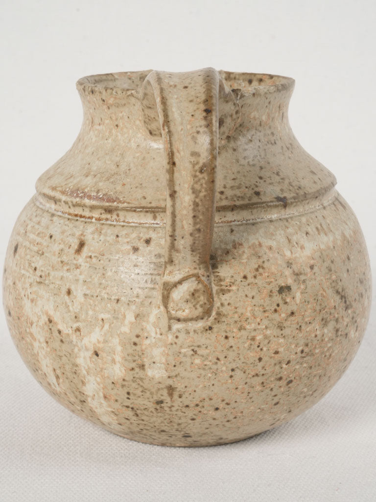 Elegant artisanal clay pitcher