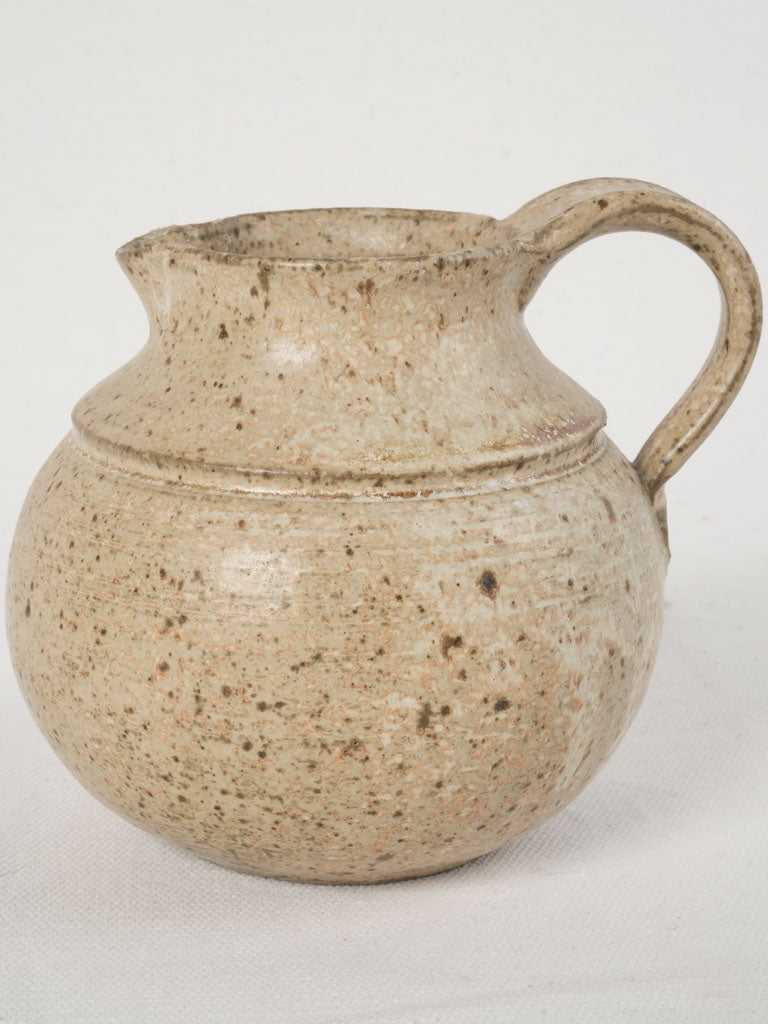 Neutral tone stoneware creamer