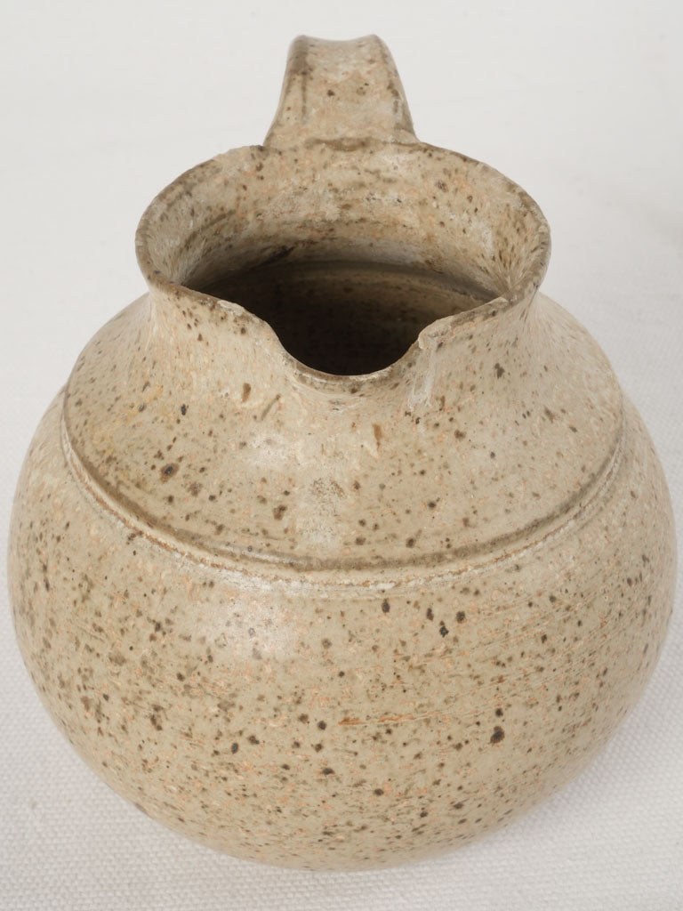 Delightful speckled beige pitcher