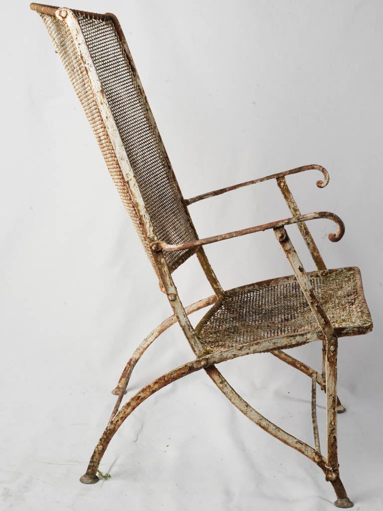 Timeworn patina outdoor armchair