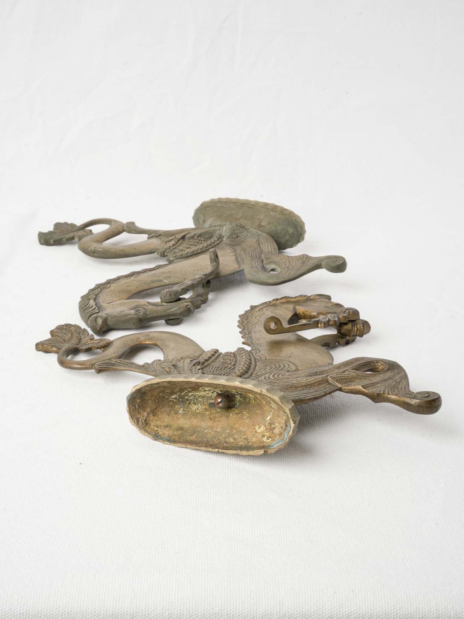 Detailed foliate-tail ornaments