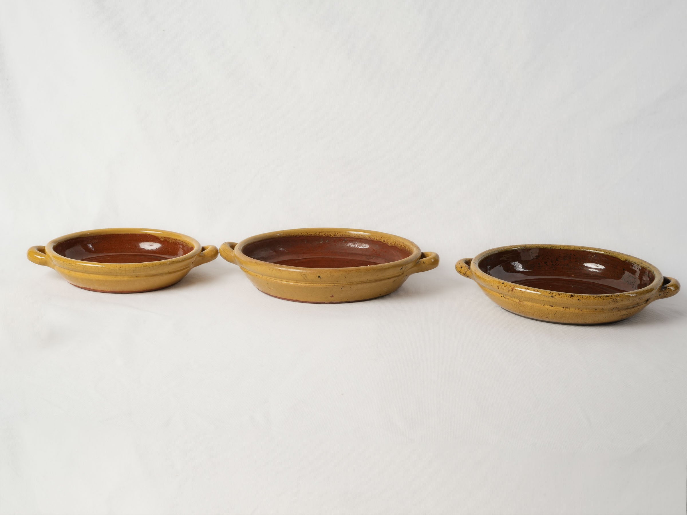 Set of Four French Terracotta Gratin Dishes with Honey Glaze