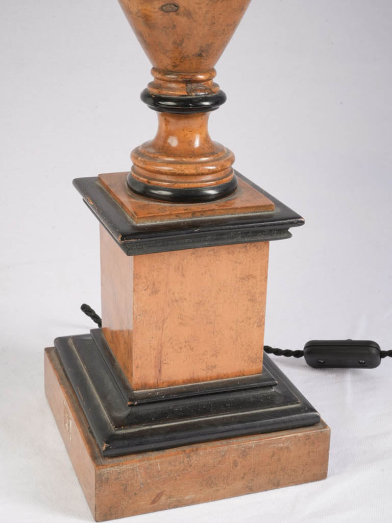 Ebonized accented plinth base lamps