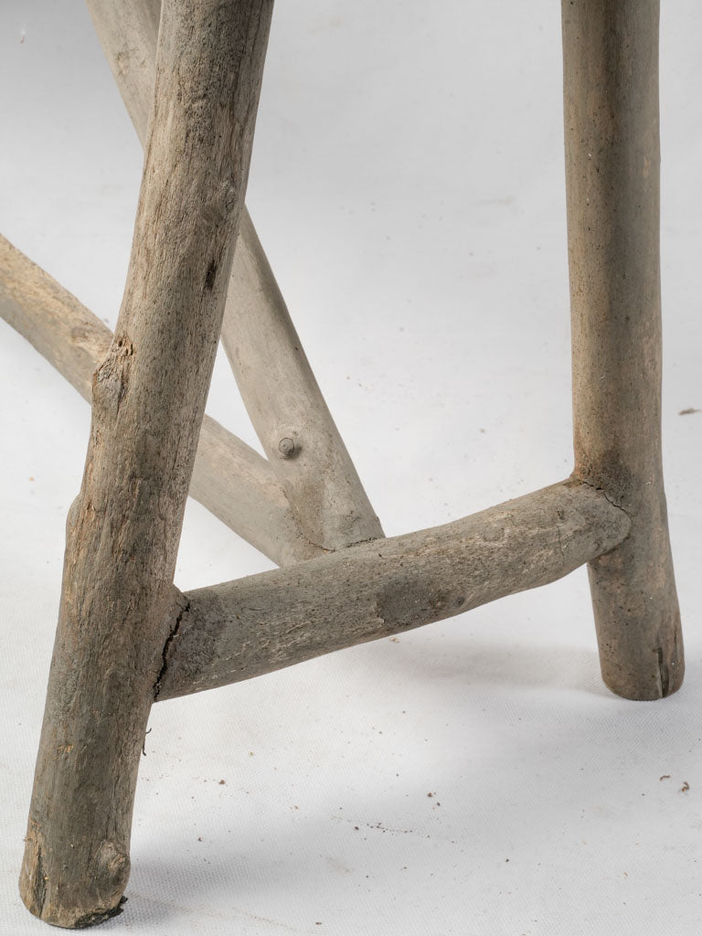 Sun-bleached patina driftwood bench