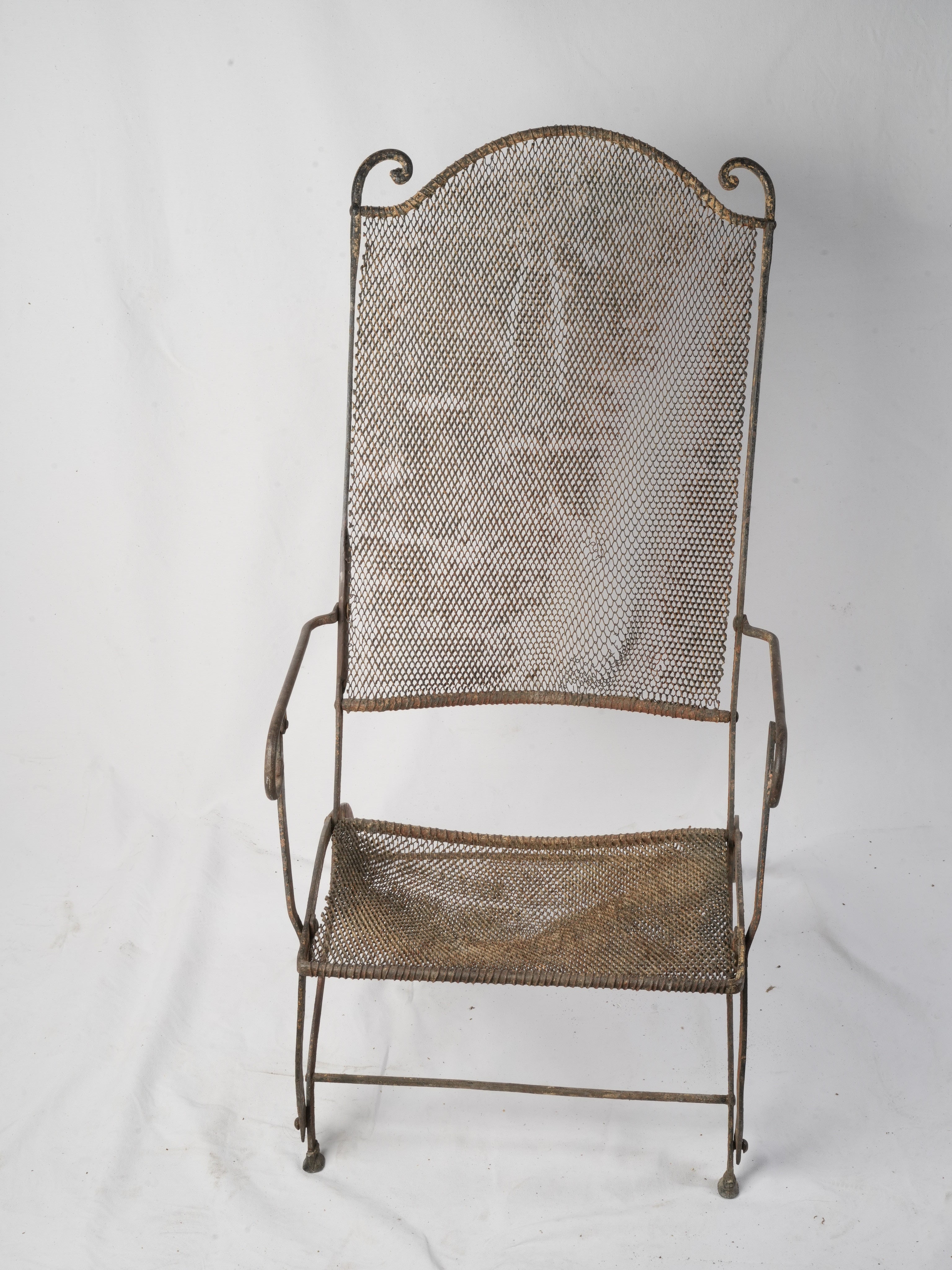 Decorative antique iron garden armchair