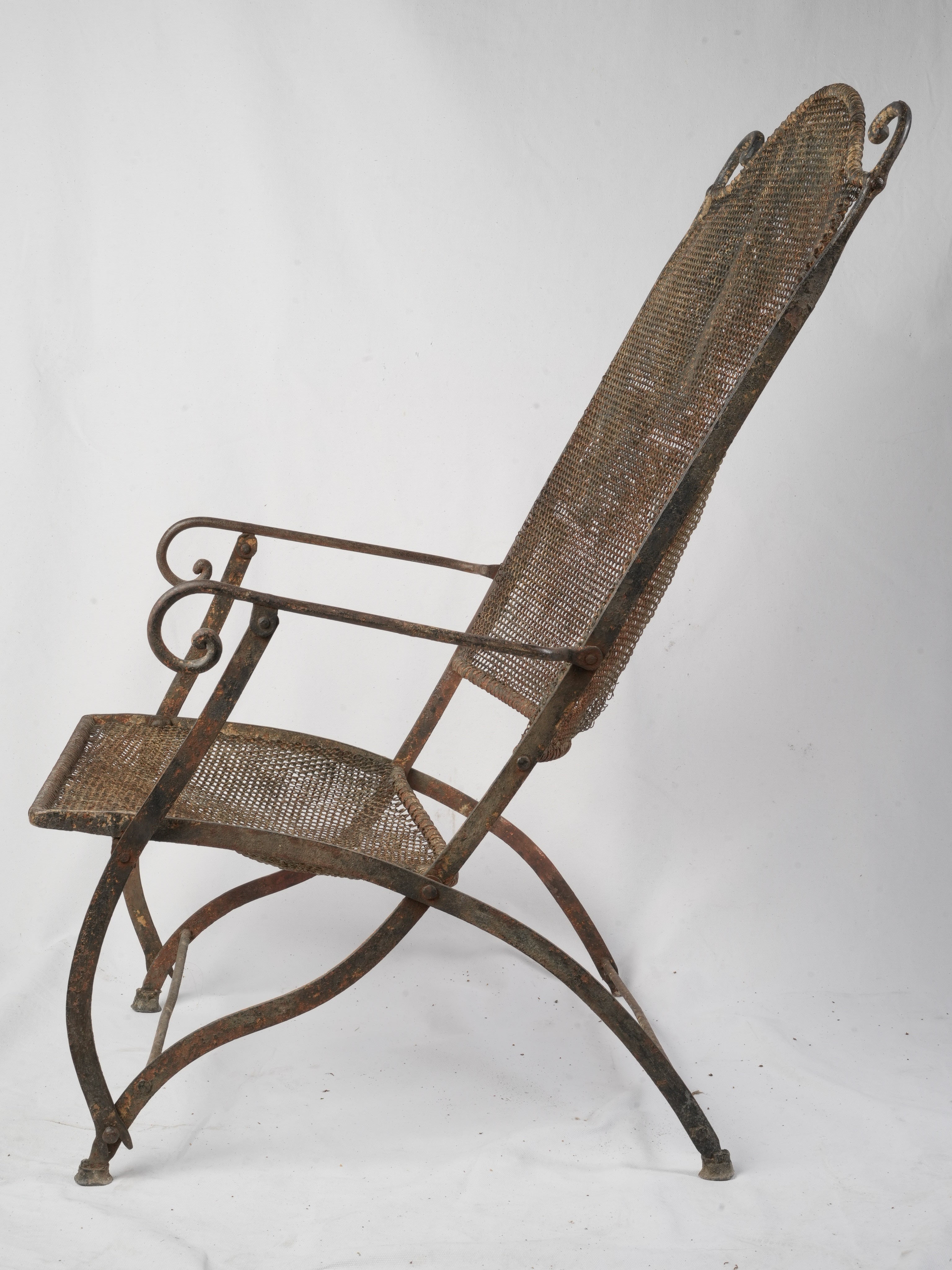 Sculptural artisanal metalwork garden chair