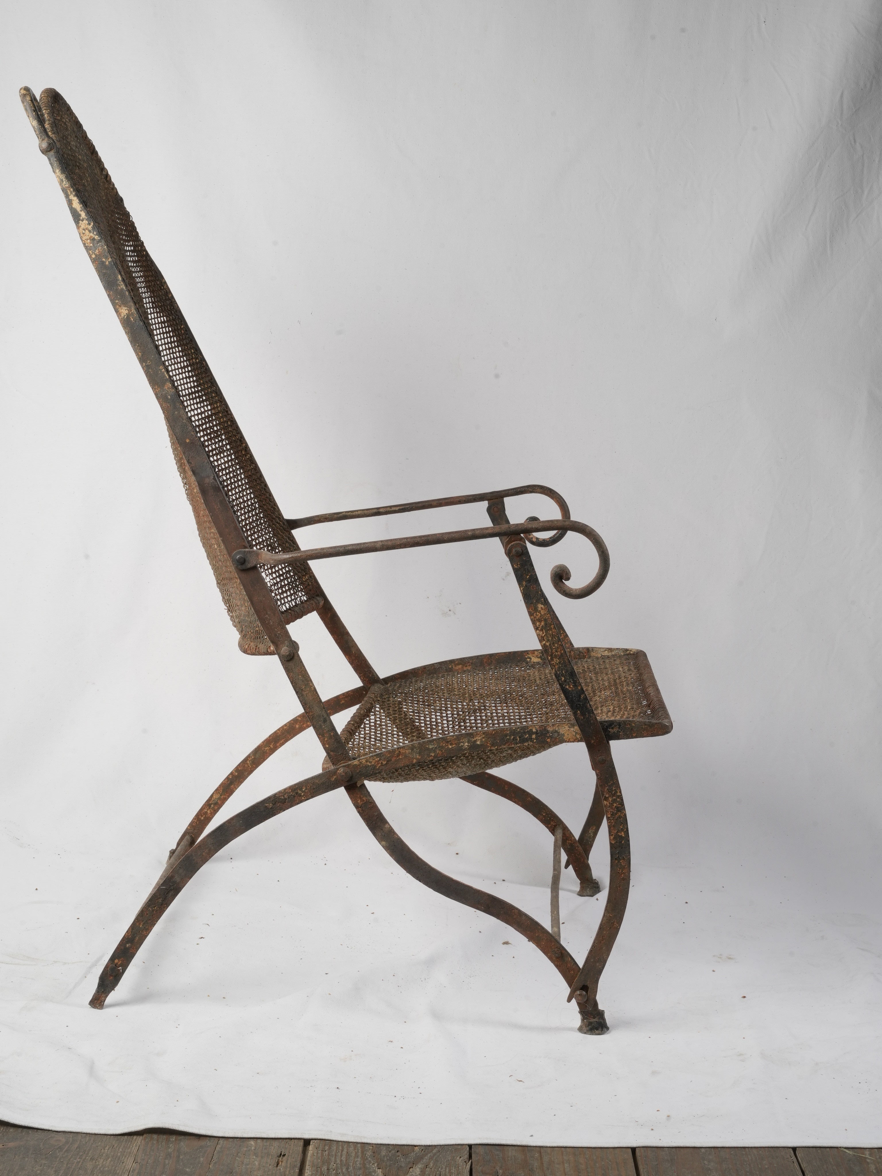Dark timeworn frame French armchair