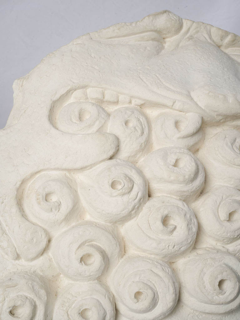 Textured mid-century mask sculptures